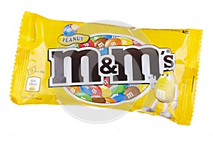 M&MÃ¢â¬â¢s peanut candies isolated on white background.